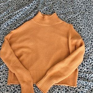 American Eagle gold cropped turtleneck sweater